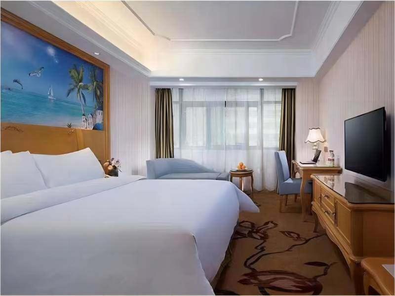 Vienna International Hotel Fenghua Zhongshan Road Esterno foto