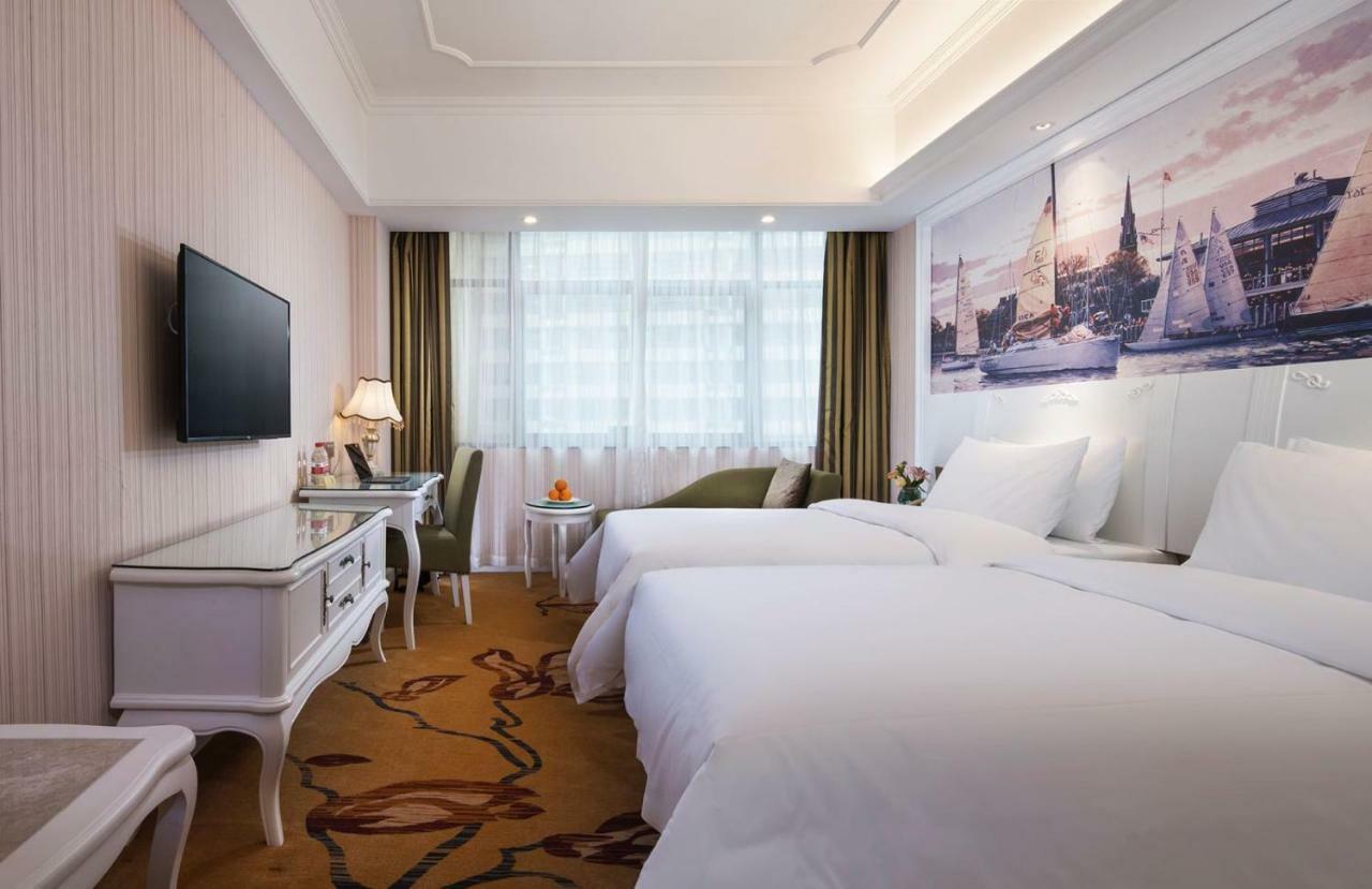 Vienna International Hotel Fenghua Zhongshan Road Esterno foto